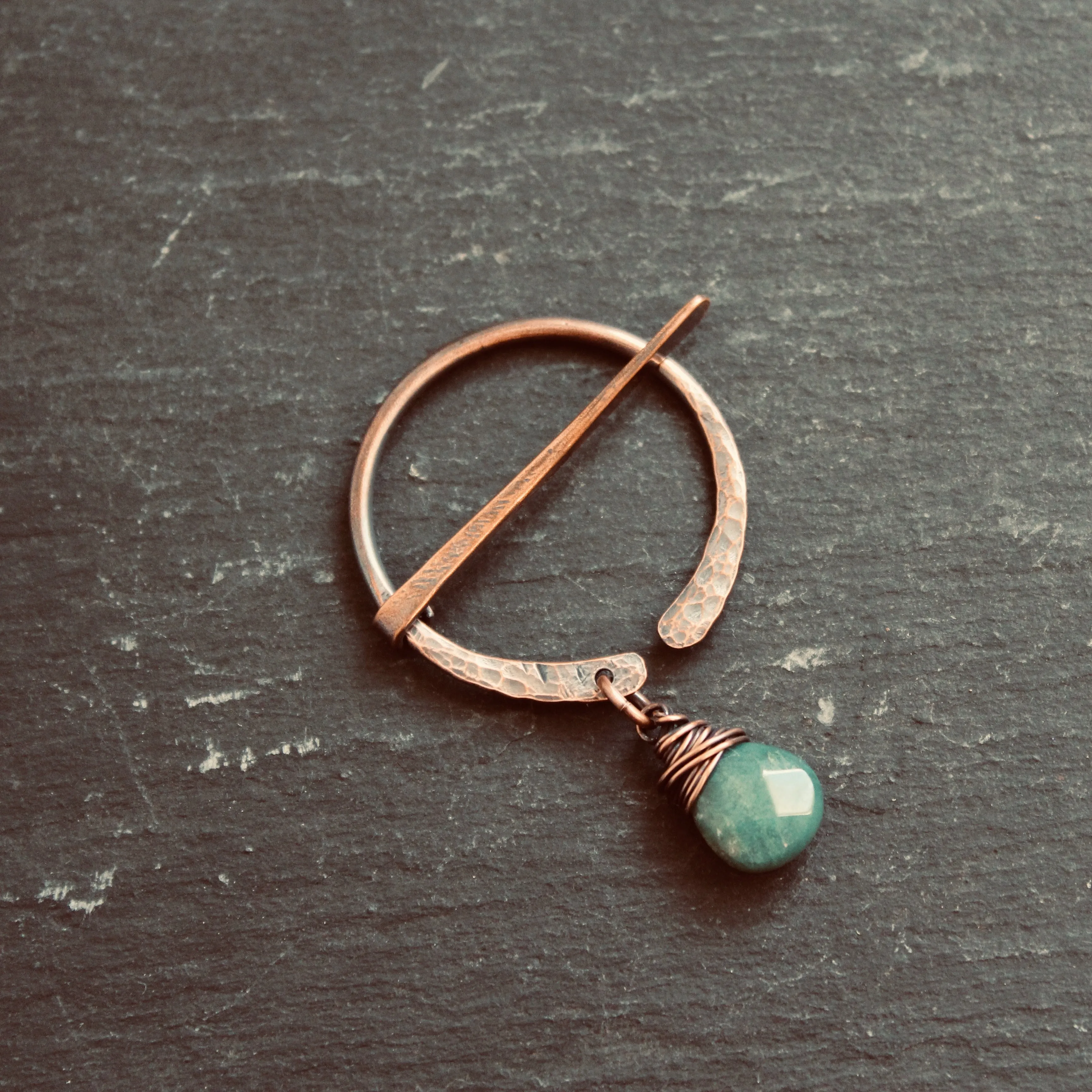 Pierced Pennanular Brooch with Moss Agate